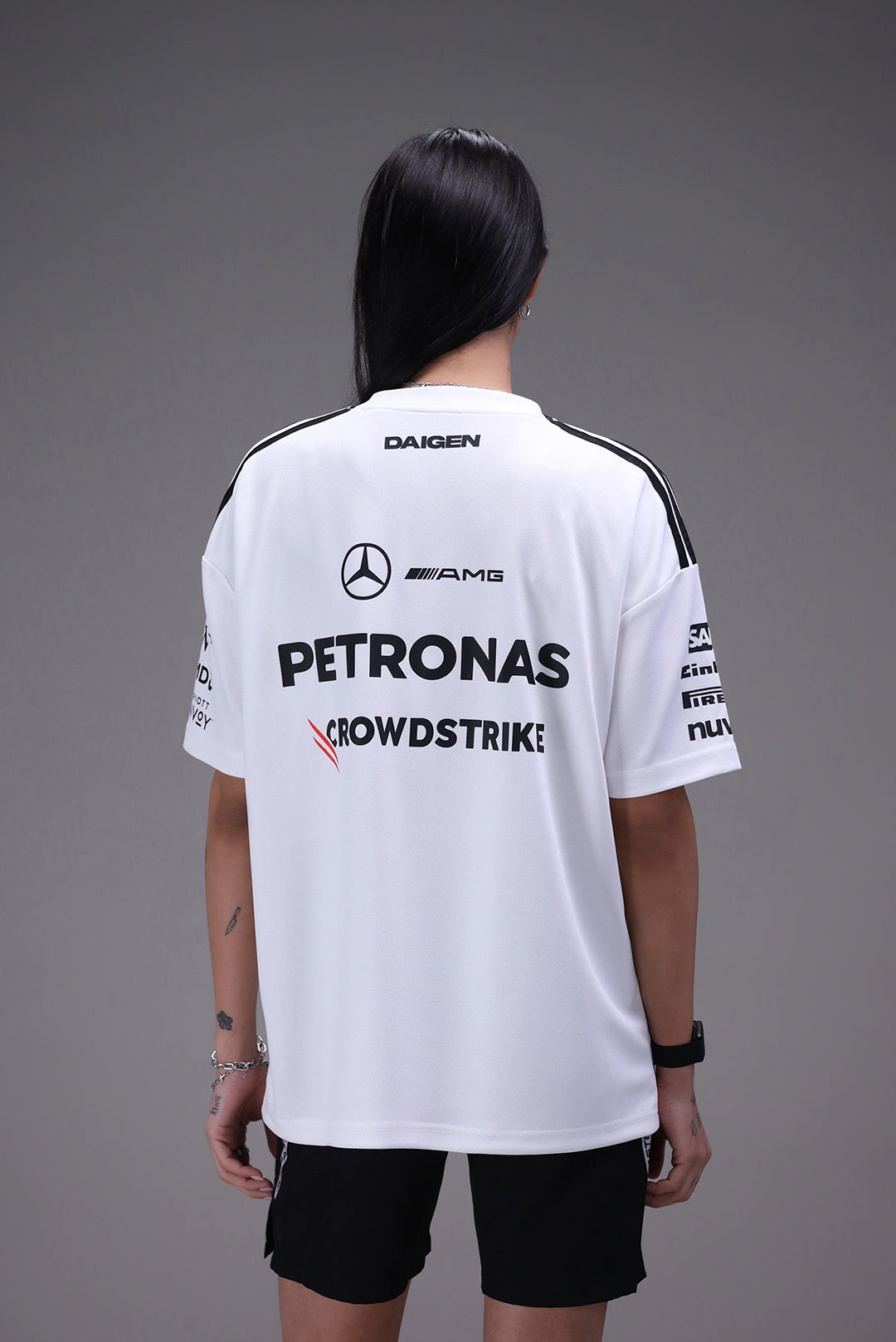 Mercedes Petronas jersey fabric and logo detail close up